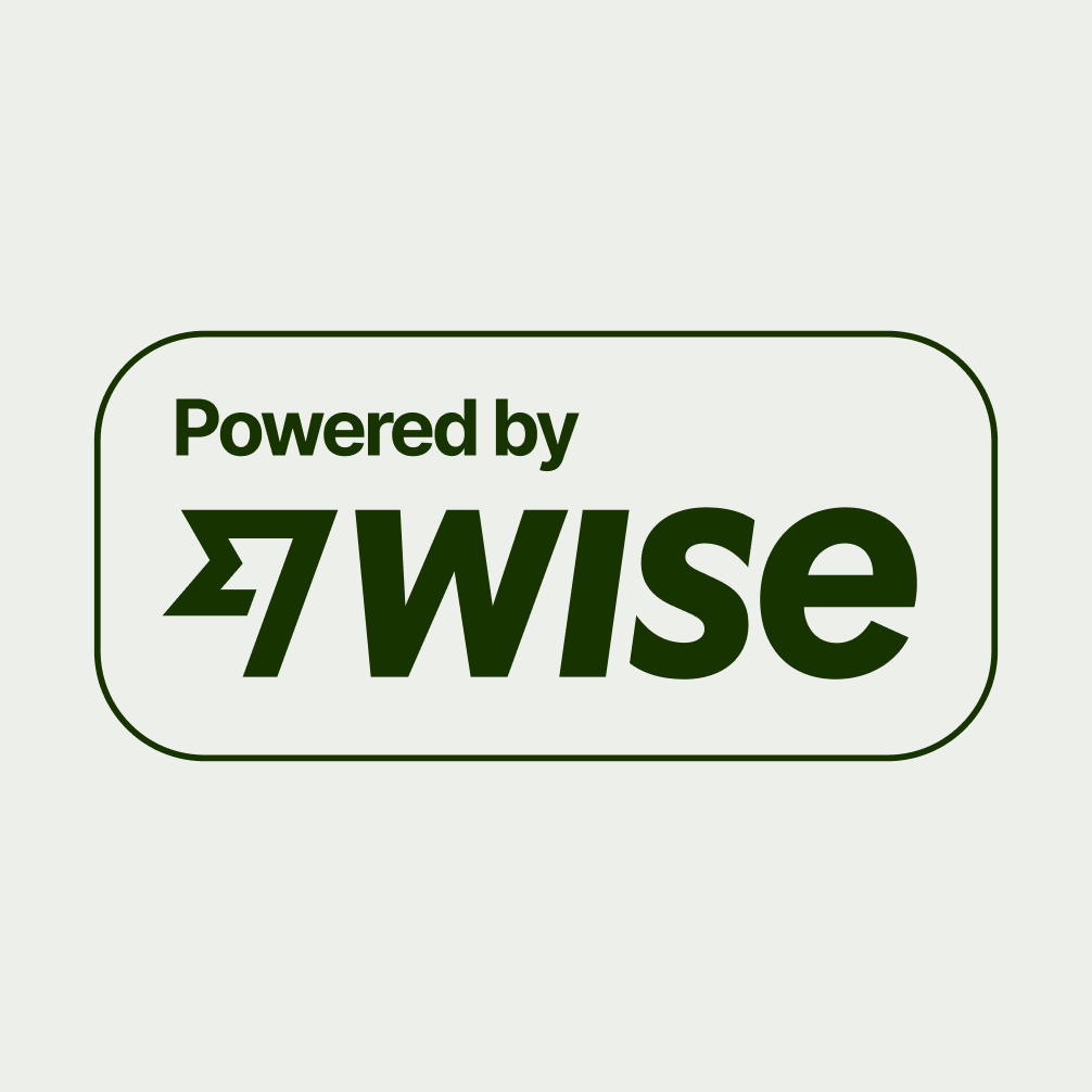 Powered by Wise badge in white.