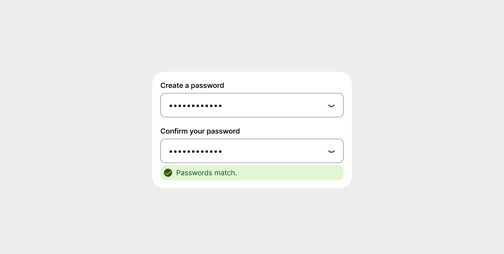 A password creation interface showing two input fields with a green success message stating "Passwords match."