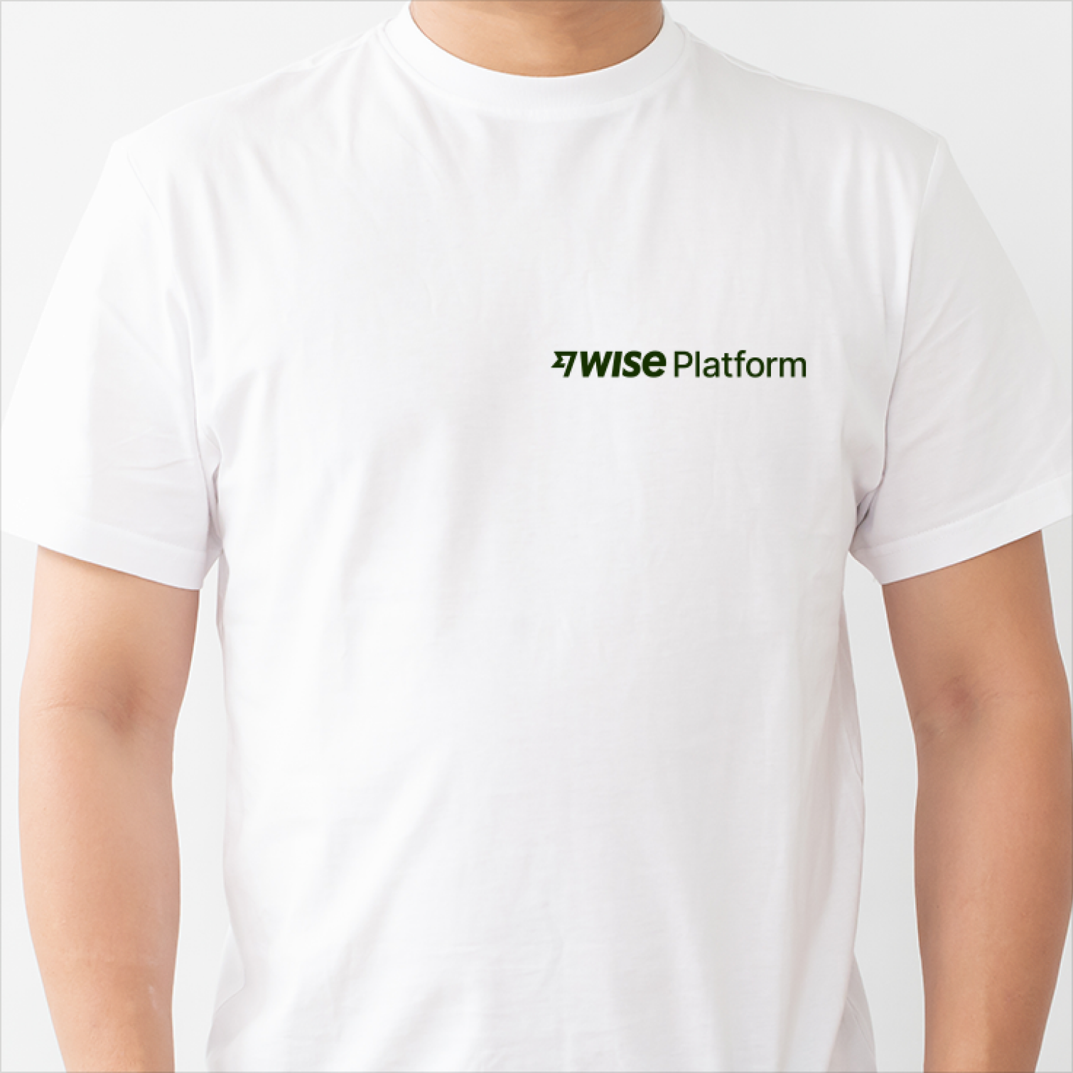 person wearing a white t-shirt with a Wise Platform logo on the right side