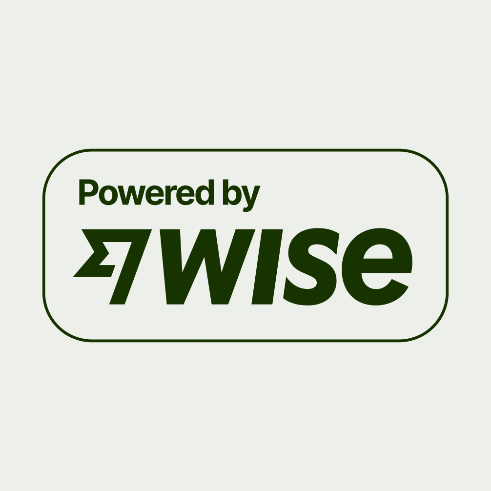 Powered by Wise badge in white.