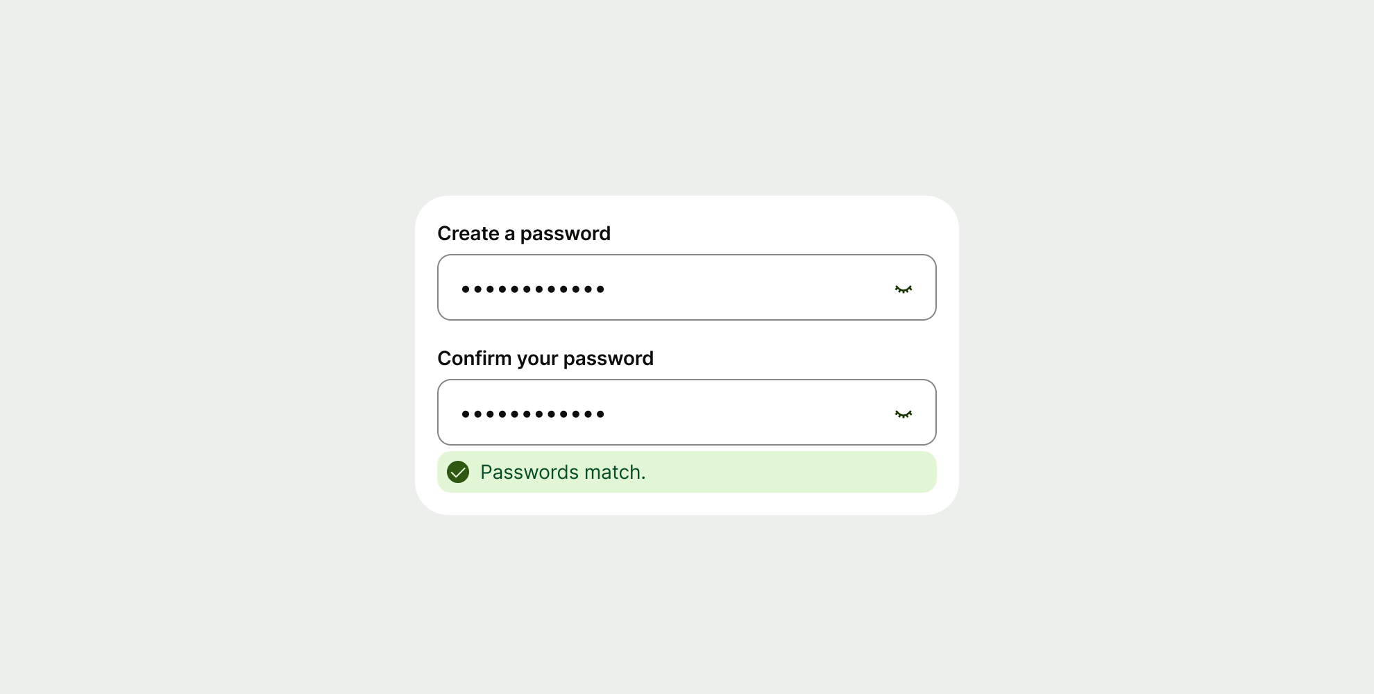 A password creation interface showing two input fields with a green success message stating "Passwords match."